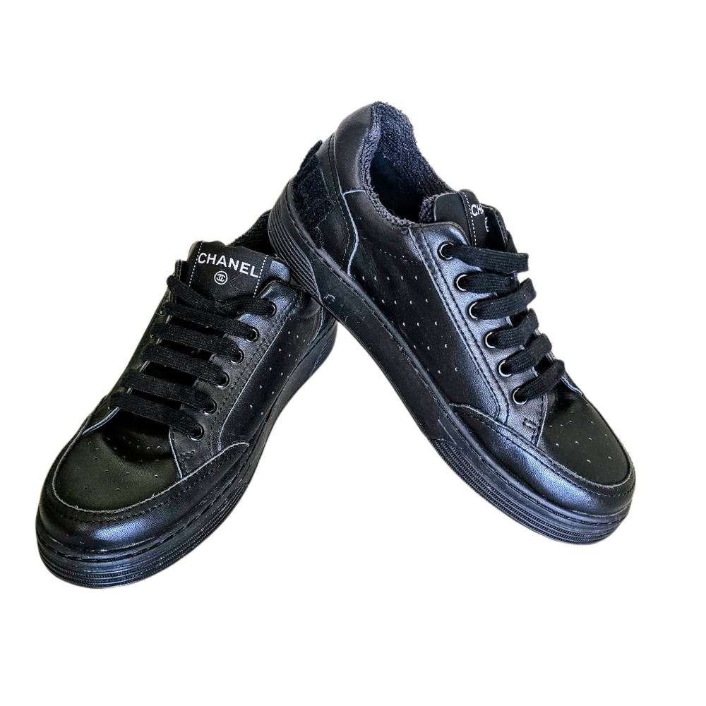 CHANEL women's calfskin sneaker with terrycloth CHANEL on heel, black size 7.5